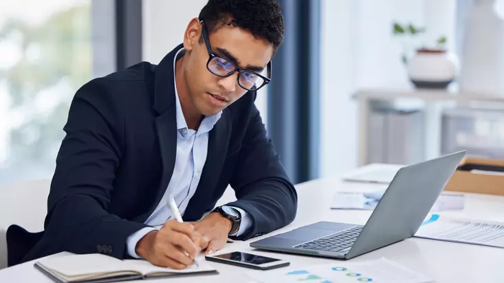 business man writing 